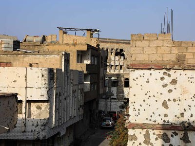 Bullet holes in buildings and walls in Taiz city, Yemen
